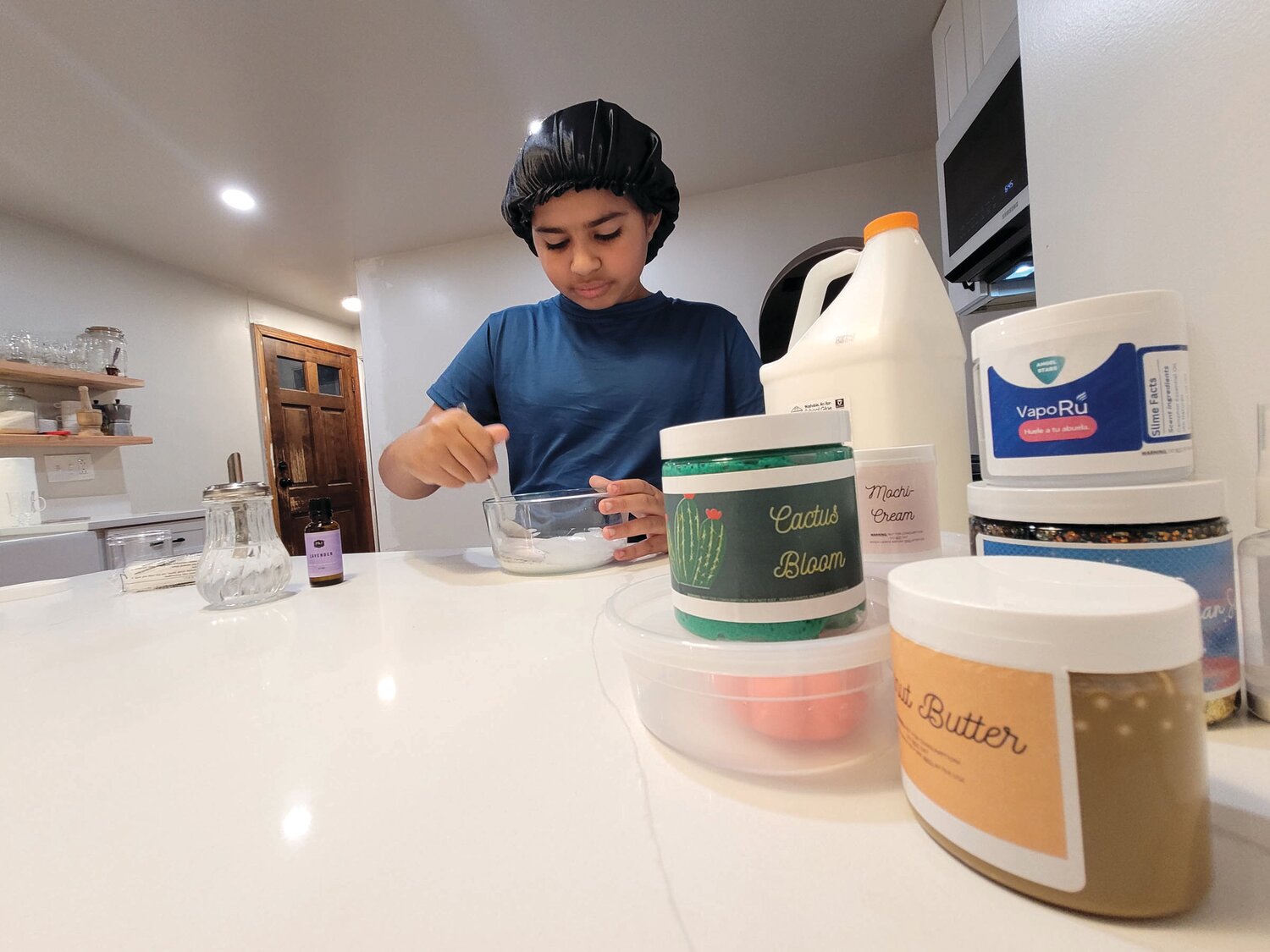 SLIME SALES: A Ferri Middle School seventh-grader may be one of the Ocean State’s youngest entrepreneurs. Penelope Santos, the founder of Angel Stars Slime LLC, makes and sells all sorts of slime. Some of the vast selection is shown here.